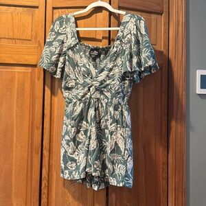 Green/white romper size medium